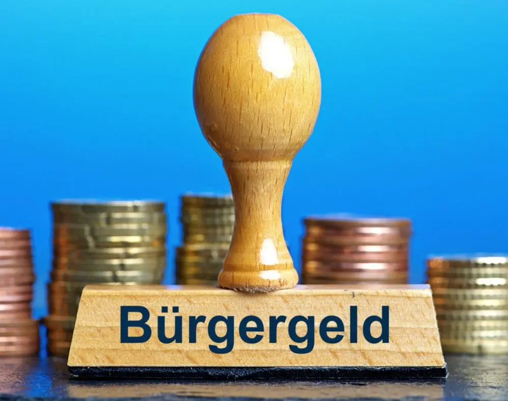 Bürgergeld Das Bild zeigt einen Stempel mit dem Aufdruck Bürgergeld.