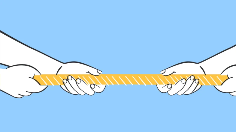 Tauziehen - zwei Paar Hände ziehen an den beiden Enden eines Seils