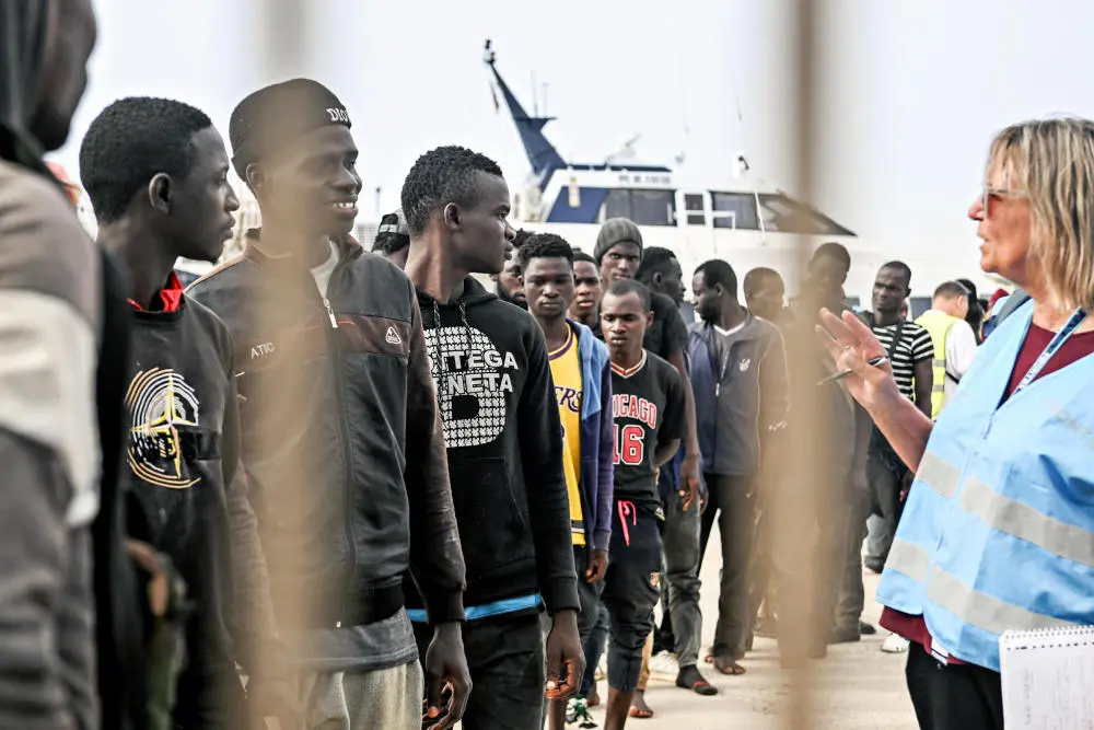 Bootsmigranten gehen auf der italienischen Mittelmeerinsel Lampedusa an Land. Bootsmigranten gehen auf der italienischen Mittelmeerinsel Lampedusa an Land.