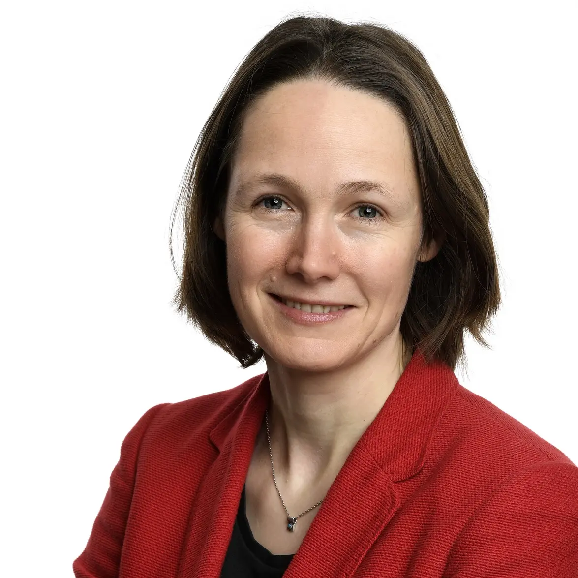 Porträt von Ingrid Nestle im roten Blazer