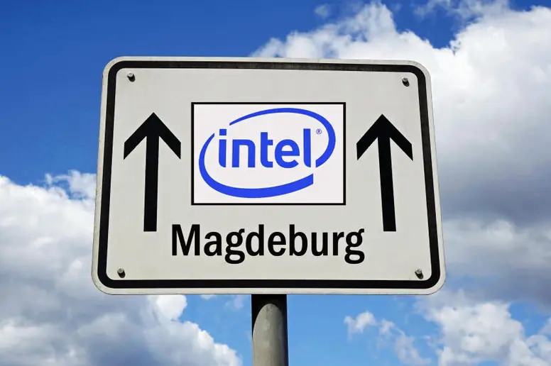 Nach Magdeburg zeigendes Straßenschild mit dem intel-Logo