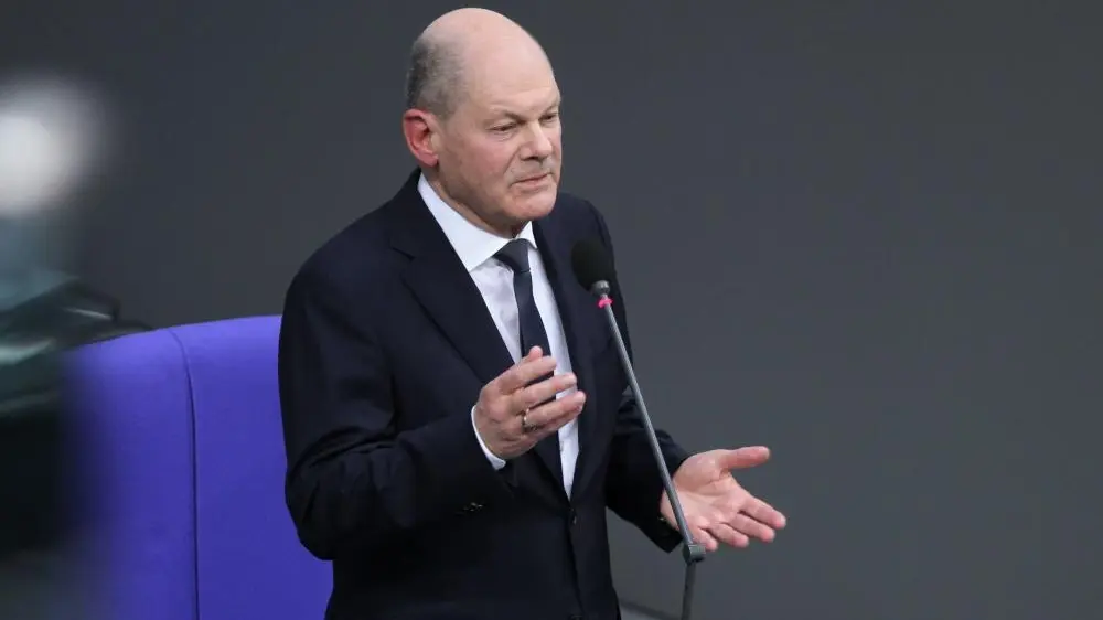 Olaf Scholz am Mikrofon