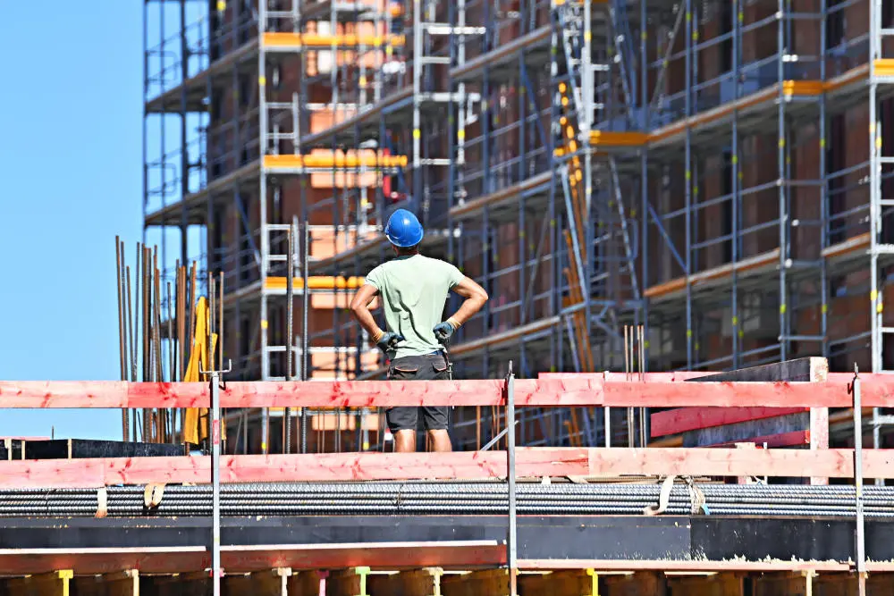 Bau-Etat Bauarbeiter auf einer Großbaustelle in München