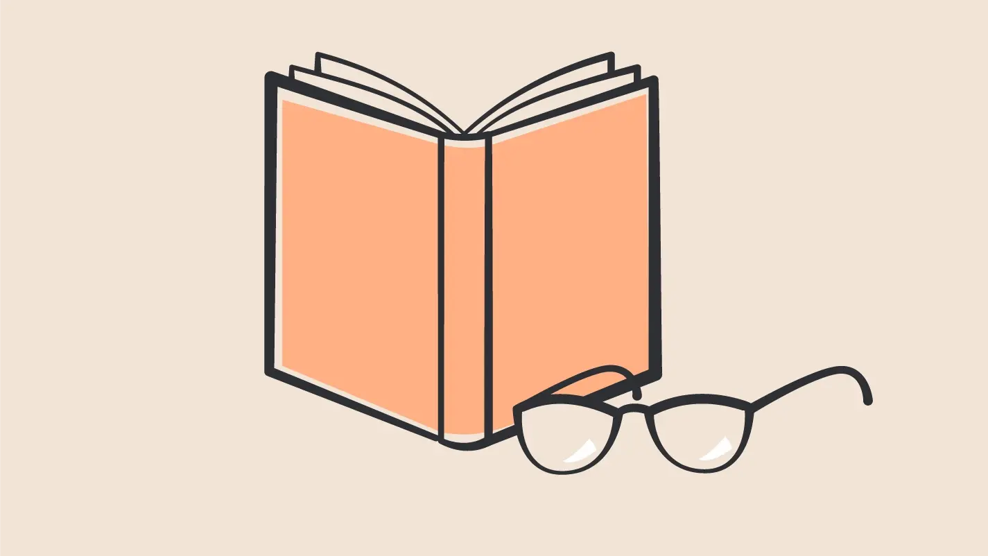 Ein Buch mit einer Brille