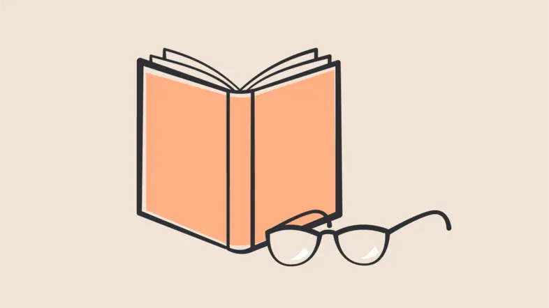 Ein Buch mit einer Brille