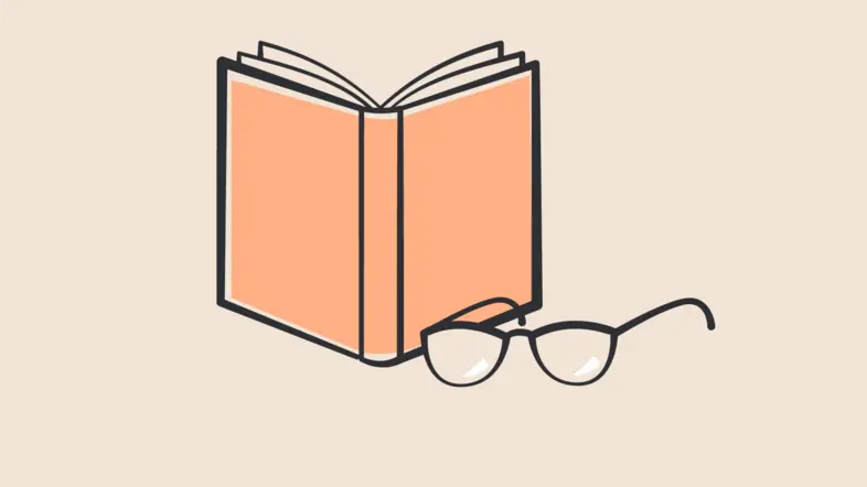 Ein Buch mit einer Brille