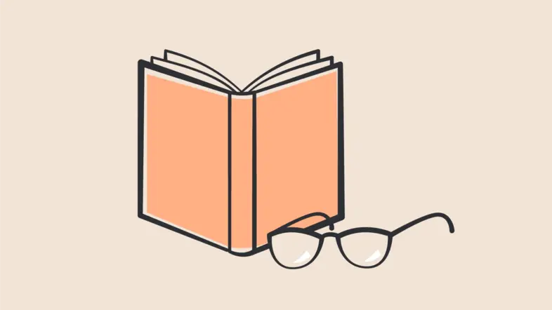 Ein Buch mit einer Brille