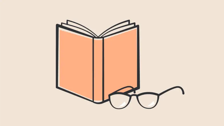 Ein Buch mit einer Brille